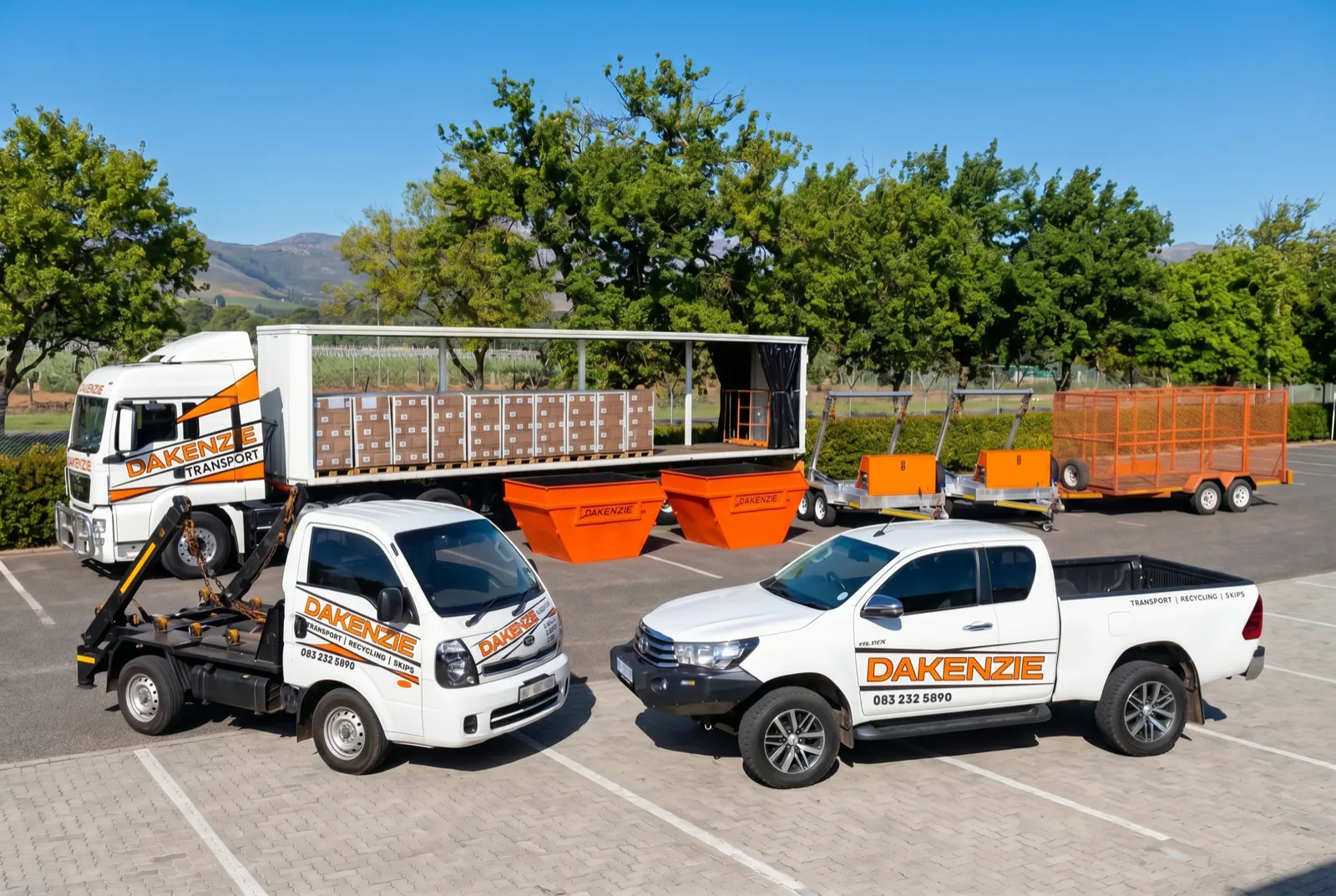 The Dakenzie fleet: MAN truck, bakkie, skips, cages and trailers
